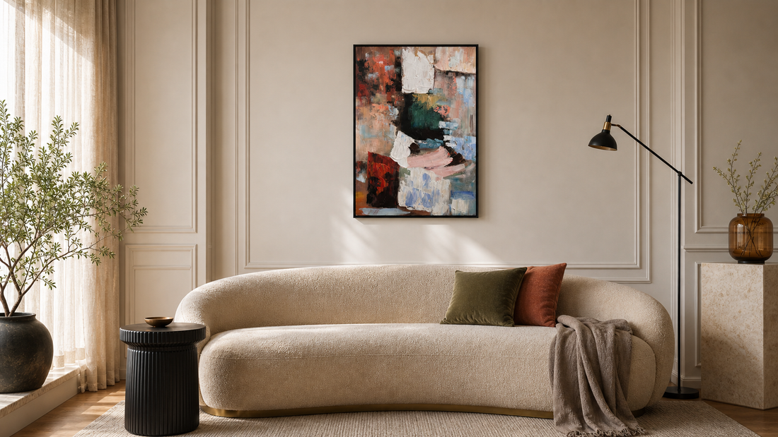 Blush and Moss hand-painted textured wall art above a curved sofa in a warm living room