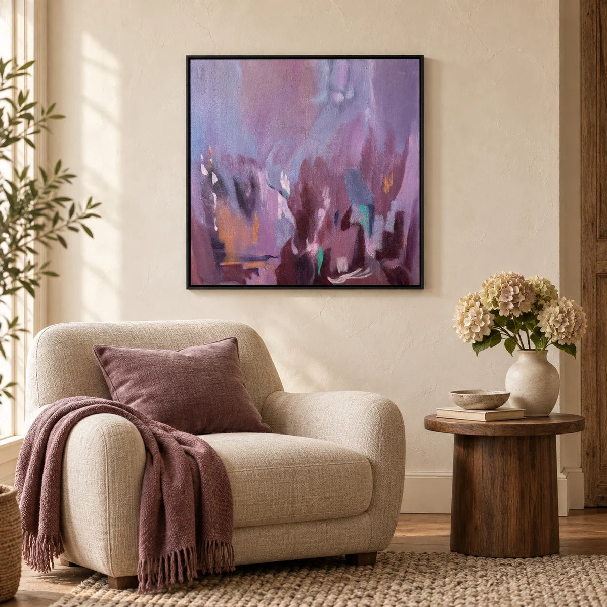Violet Layers framed purple abstract artwork above a cream armchair